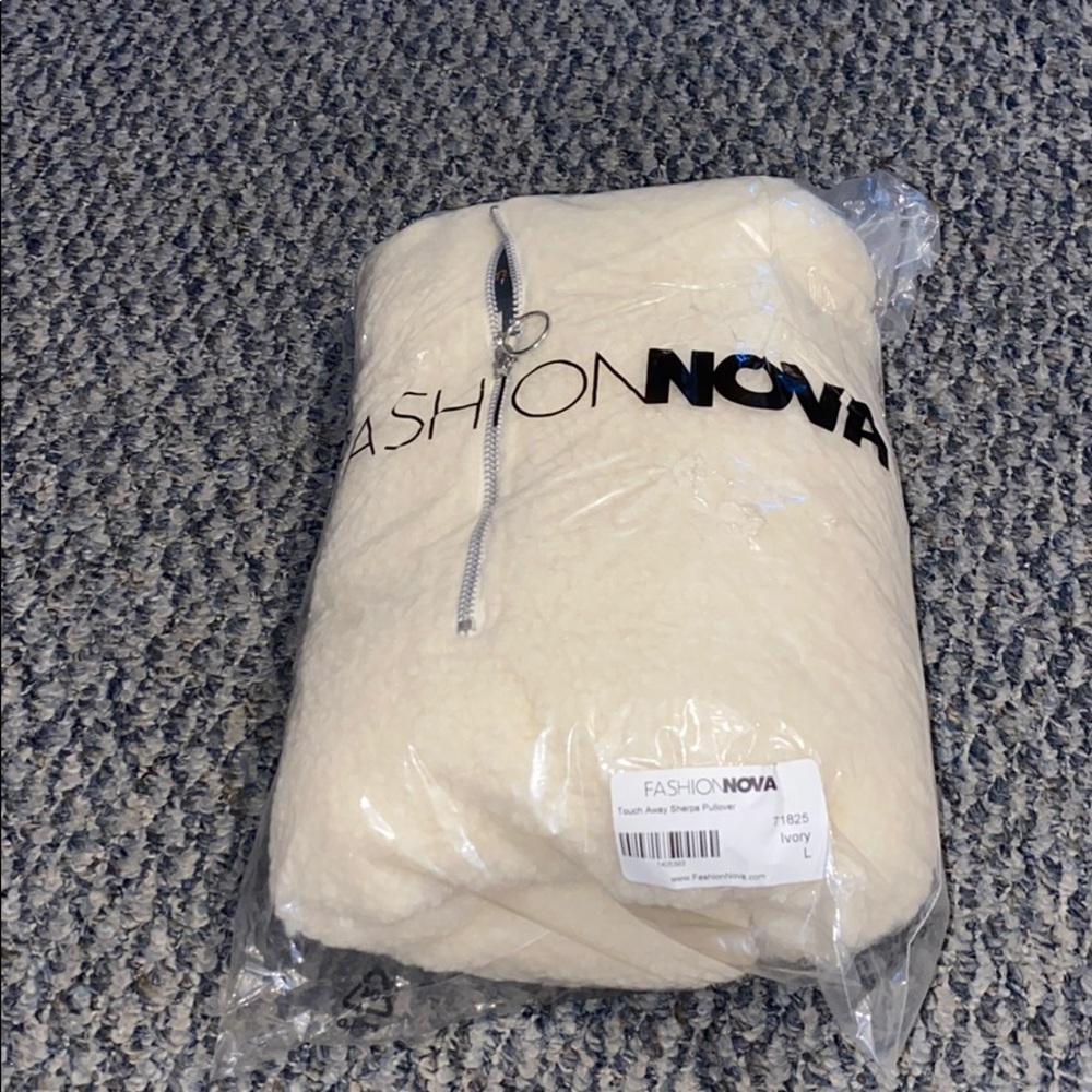 Cute Sherpa pullover jacket.